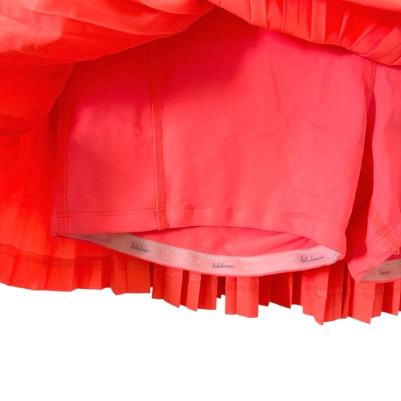 Lululemon Pleat to Street Skirt II in "Grapefruit" Neon Size 8 - Picture 8 of 14